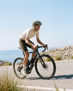 Cyclist on a coastal road